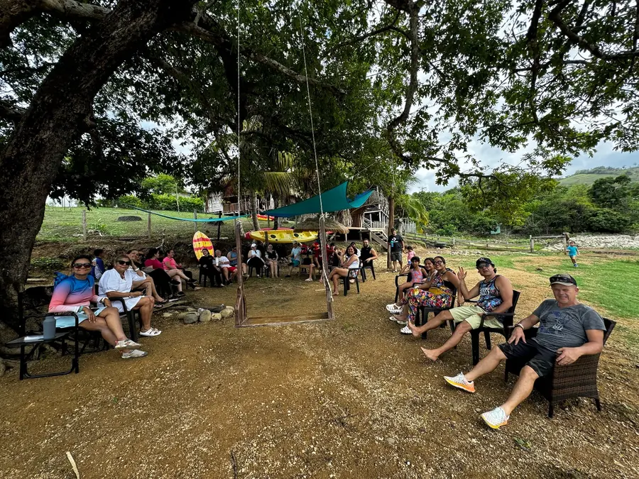 A group under the canopies on the property